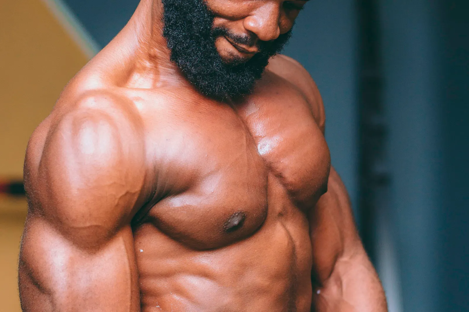 Muscular man training in a fitness center