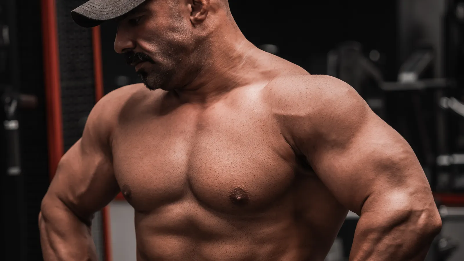 Person training triceps with a dumbbell