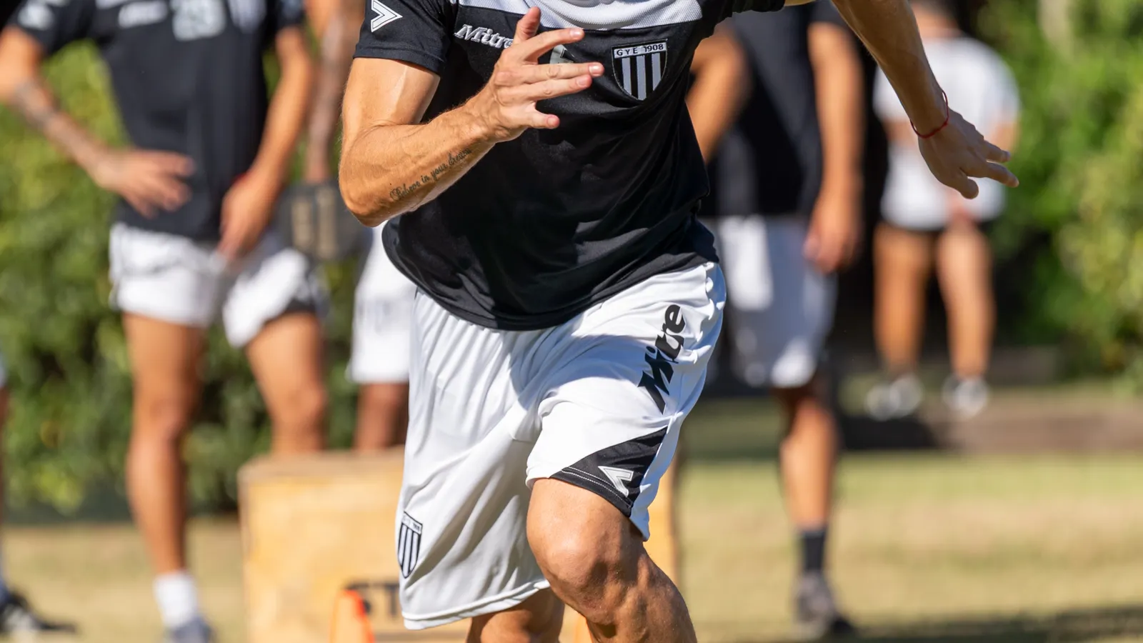 Person training with a running drill