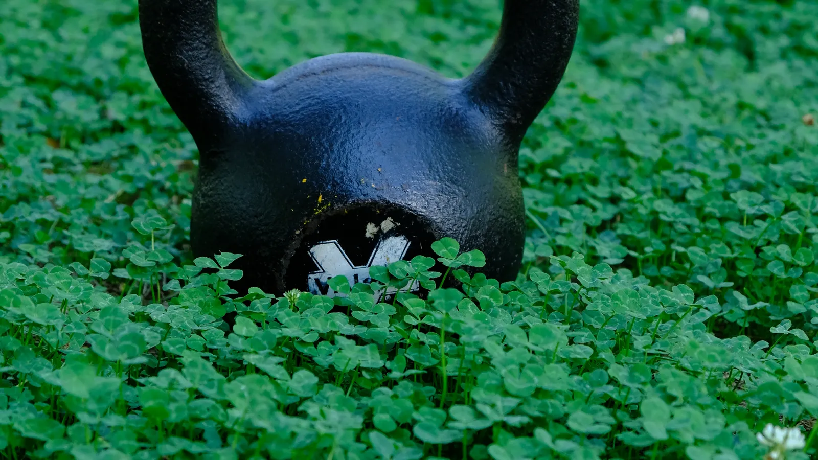 Person performing a kettlebell get-up