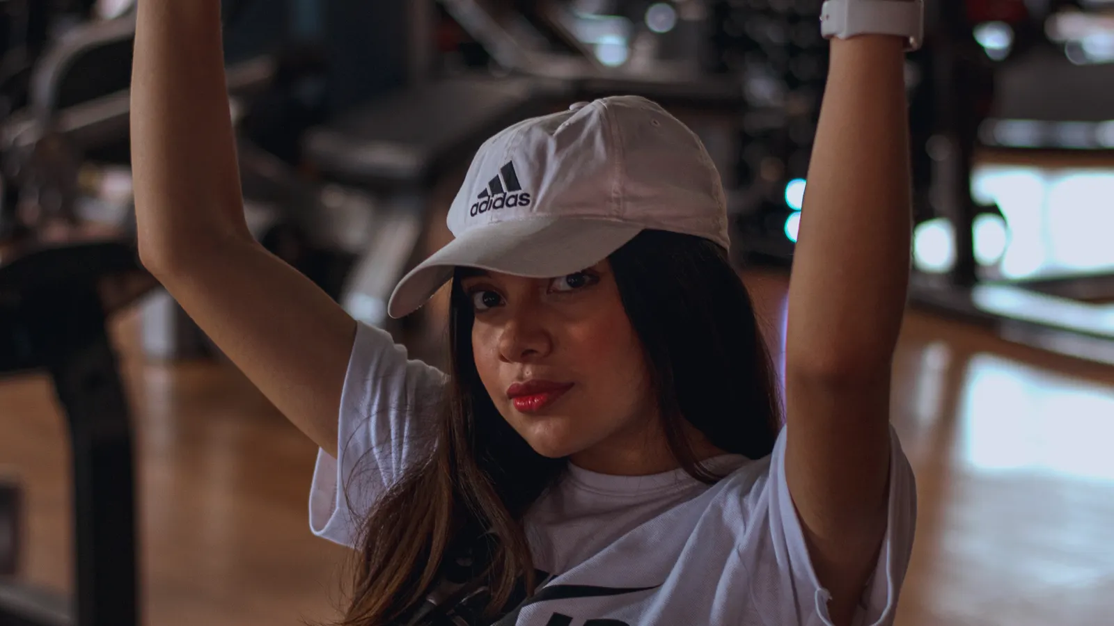 Young woman training in a modern gym during a HIIT session